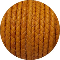 Cordon de cuir rond tressé de 5mm jaune moutarde en vente au cm