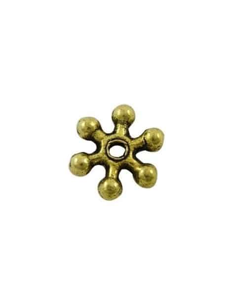 Perle asterisque en metal couleur or antique