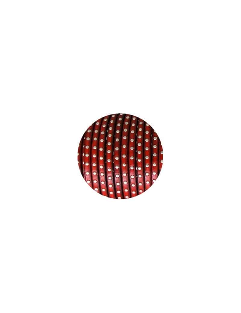 Cuir plat de 5mm rouge avec des clous argent vendu au cm