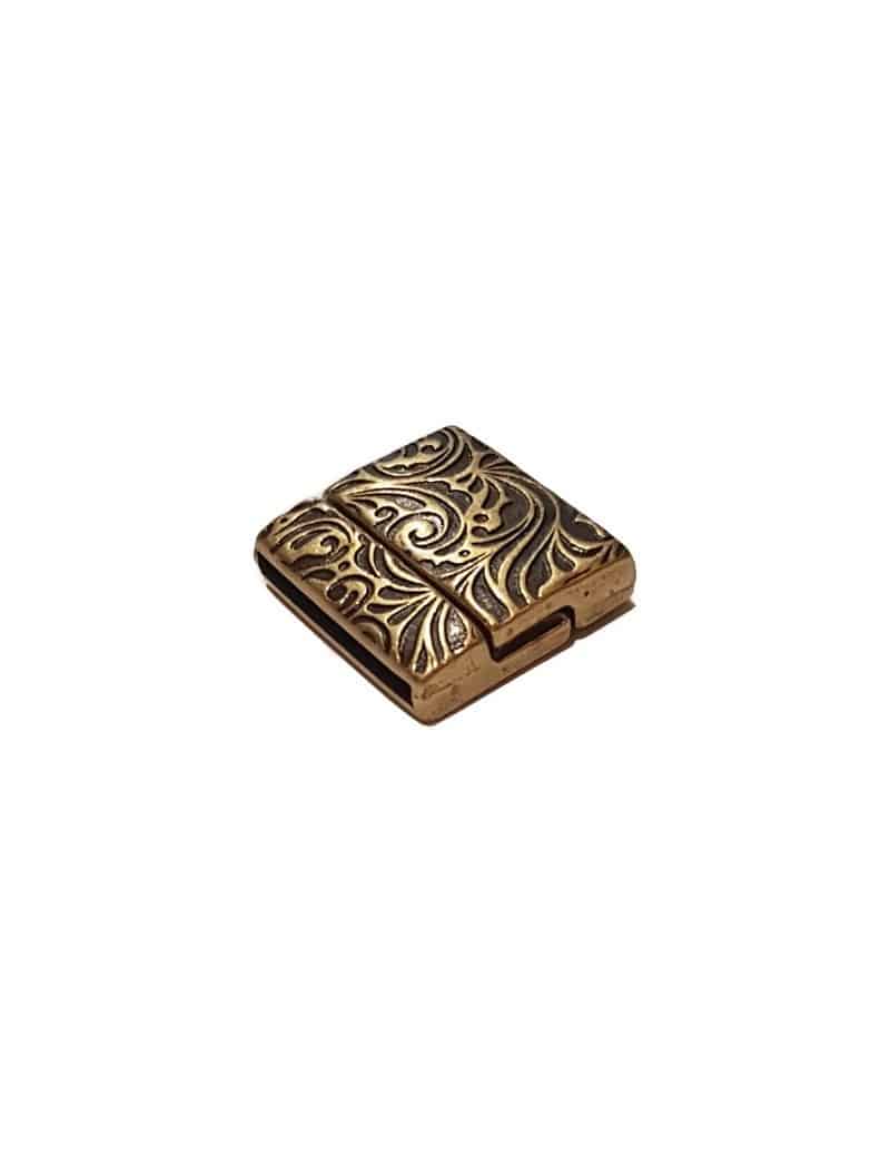 Fermoir aimanté relief floral placage bronze avec trou de 20mm Fermoir aimanté relief floral placage bronze avec trou de 20mm