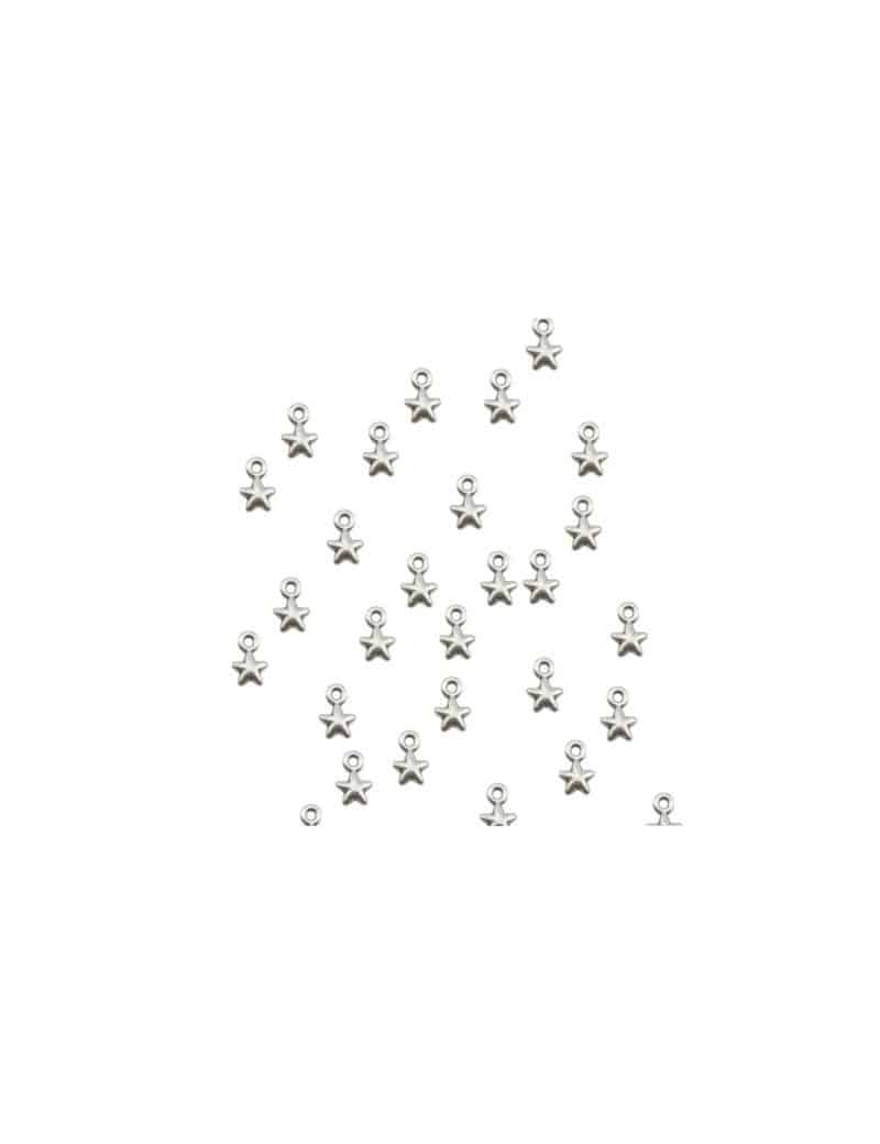 Lot de 10 petites étoiles bombées de 5mm en placage argent